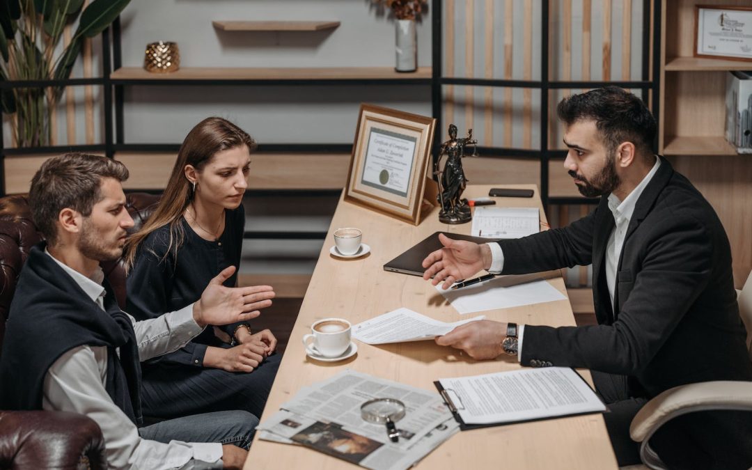 Male Lawyer talking to his Clients